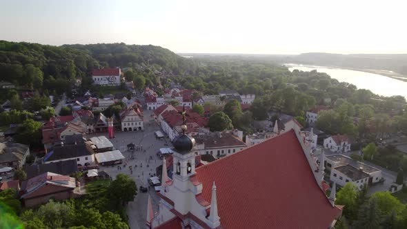 Aerial View of the Old European Church in the Town Near the River on Sunset