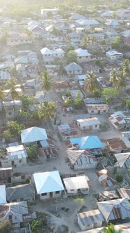 Zanzibar Tanzania  Aerial View of Houses Near the Coast Vertical Video alt