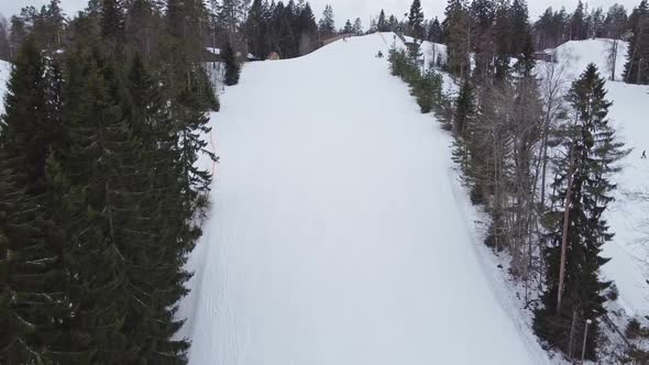 Aerial View of Downhill Skiing at Local Ski Resort. Ski Lift. Russia, Leningrdaskaya Oblast, Village