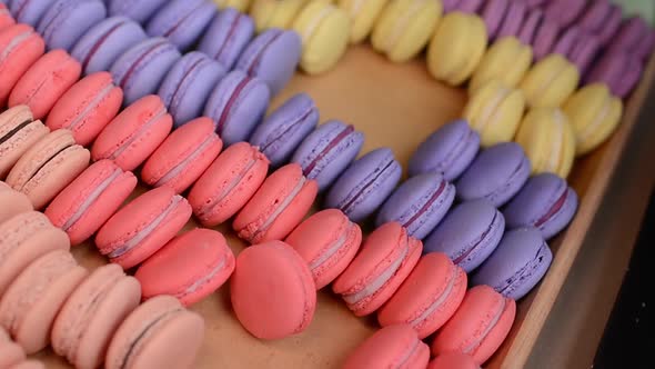 Colorful Macarons on a Wood Table