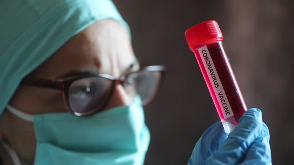 Doctor holding a recipient with the coronavirus COVID-19 vaccine