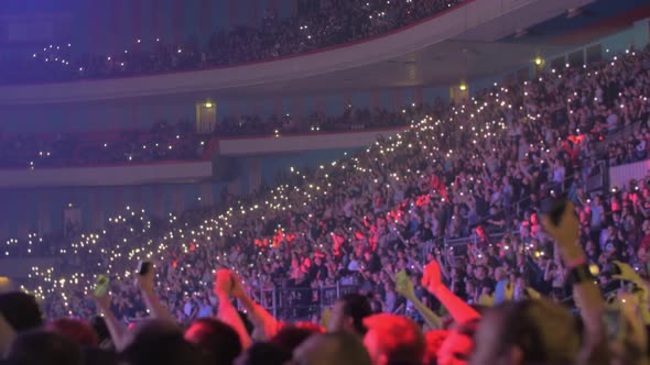 Large Audience Inside an Arena Hip-hop Concert alt