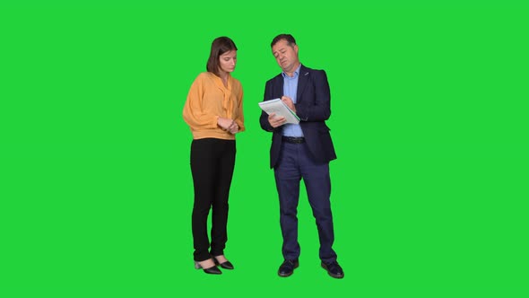 Women and men working together. alt