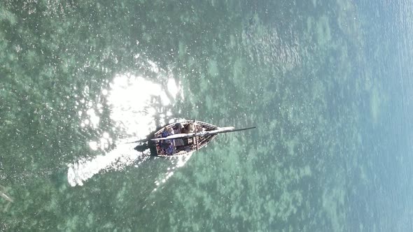 Vertical Video Boats in the Ocean Near the Coast of Zanzibar Tanzania Aerial View alt