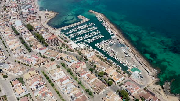 Aerial drone footage of the beach front on the Spanish island of Majorca Mallorca, Spain alt