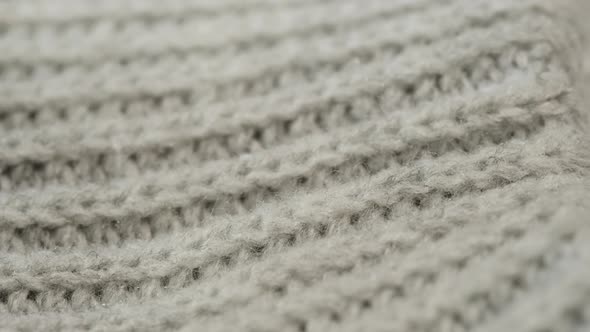 Grey Knitted Cloth Light Gray Woolen Clothes Fabric Closeup Woven Textile Background alt