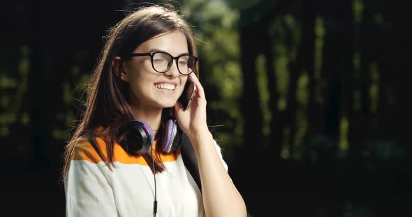 Young Woman Talking on Smartphone