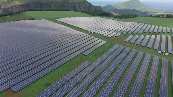 Drone Shot of Solar Panel Rows at a Solar Power Facility alt