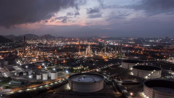 Hyperlapse timelapse aerial view oil refinery at night. moving timelapse refinery industrial.