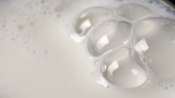 Bubbles in Milk in the Glass alt