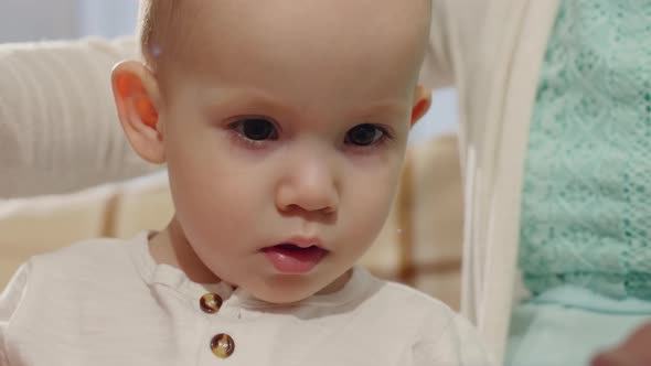 Cute Baby Playing with Toy Pyramid