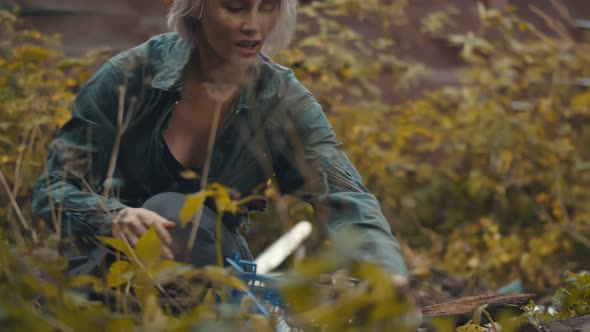 Hungry Woman Finding Provision with Food and Eating Surviving During Apocalypse alt