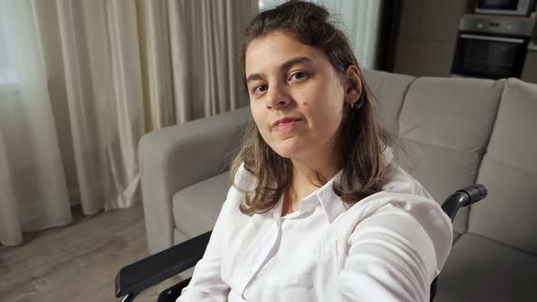 Disabled Woman Smiling to Camera alt