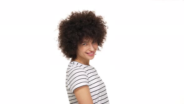 Close Up Portrait of Charming Lady Having Cool Afro Hairstyle Looking on Camera Smiling Happily with alt