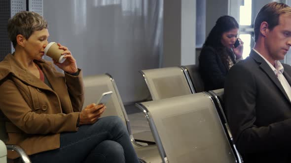 Businessman reading a newspaper alt