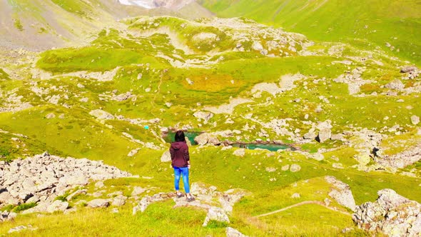 Female Person Stand Surrounded By Green Mountains Nature alt