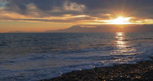 Beautiful Sunset at Beach with Golden Sun Reflection on the Sea