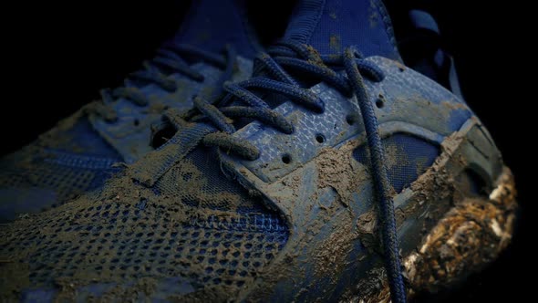 Passing Muddy Trainers In Closet - Exercise, Effort Concept alt