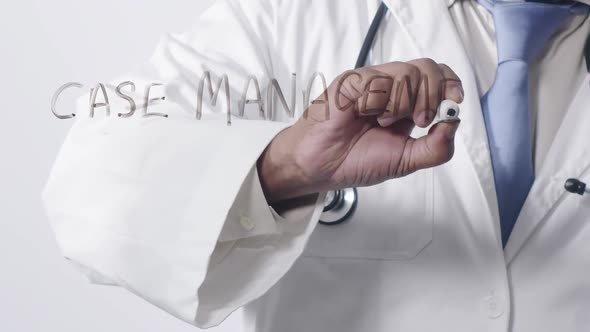 Asian Doctor Writing Case Management 
