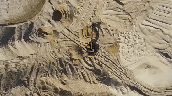 Sand quarry, opencast industrial extraction of sand for construction industry alt