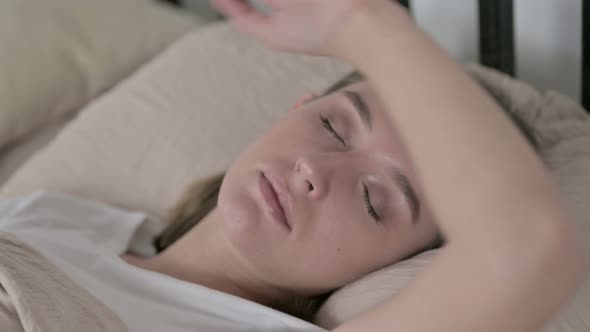 Beautiful Young Woman Sleeping in Bed at Home alt