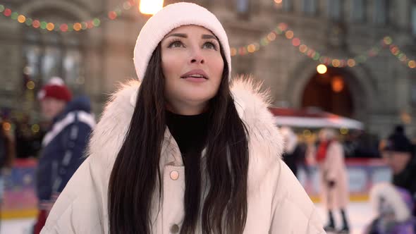 Christmas Ice Rink with a Brunette Girl