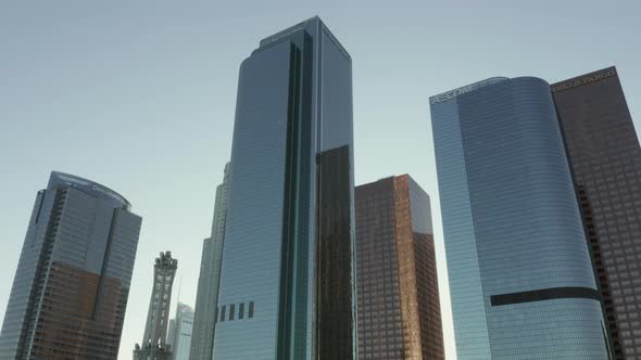 AERIAL: Backing Up From Downtown Los Angeles, California Skyline with Look at Skyline Skyscrapers at alt