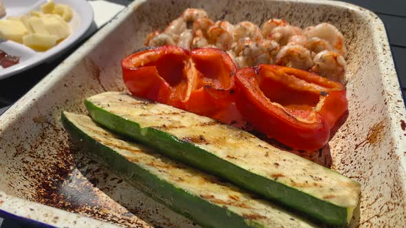 Grilled vegetables and shrimp hot off the grill alt