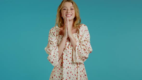 Applauding Girl with Blonde Hair Is Very Glad and Happy, She Claps Hands Because of Excellent News alt