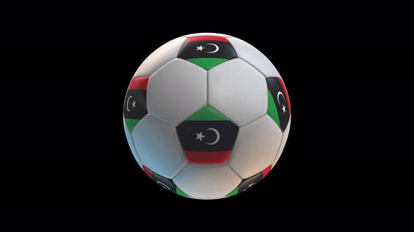 Soccer ball with flag Libya, on black background loop alpha