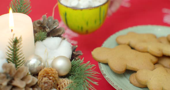 Traditional Christmas Gingerbread Cookies with Ginger on a Wooden Stand. In a Glass of Cocoa with alt