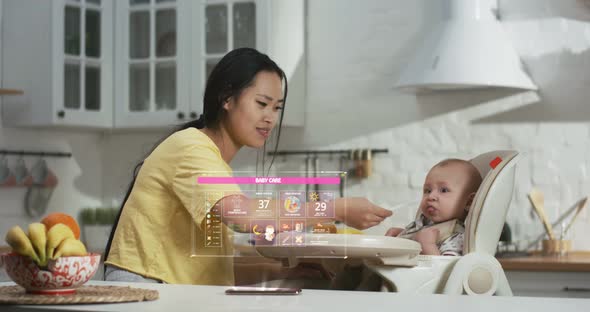 Mother Feeding Baby in Kitchen alt