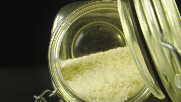Macro Shot Moving To the Inside of a Jar Filled with Rice.  alt