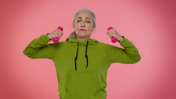 Senior Old Granny Sporty Woman Working Out Lifting Pink Dumbbells Practicing Pilates Healthcare alt