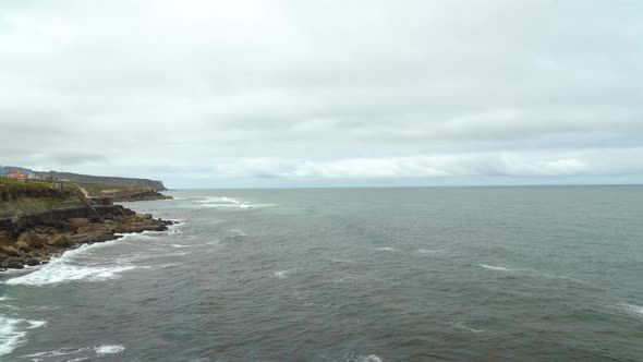 Panoramic View of North Atlantic Ocean on a Cloudy Windy Spring Day in Portugal alt