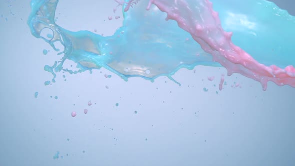 Milky green and pink liquid splash, Slow Motion alt