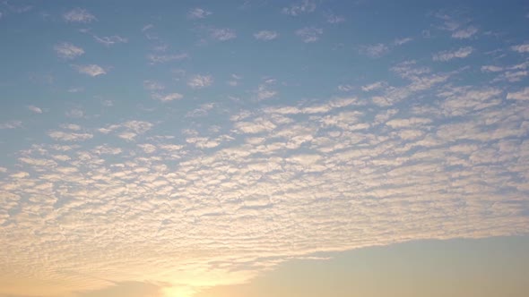 4K : Time lapse of colorful sky during beautiful sunset.  Romantic clouds. alt