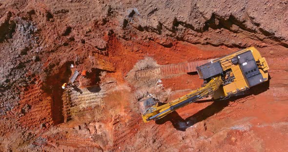 To Lay Down the Underground Storm Sewer Pipes the Excavator Digs a Pit in Order to Connect to the alt