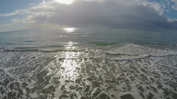Blue sea waves reaching sandy beach in Larnaca, beautiful landscape, Cyprus alt