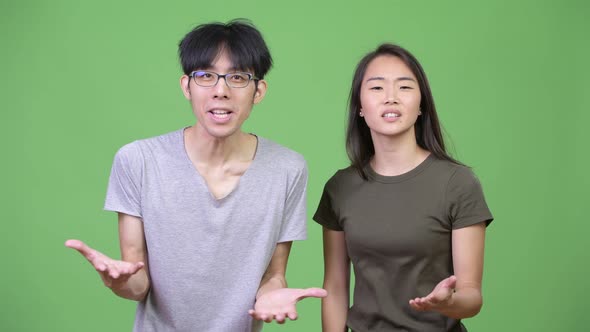 Young Asian Couple Getting Angry Together