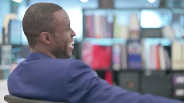 Portrait of African Businessman Feeling Happy Celebrating alt