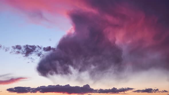 Evening sky with pink clouds at sunset, cloudy timelapse