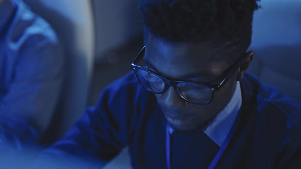 IT Specialist Working Night Shift alt