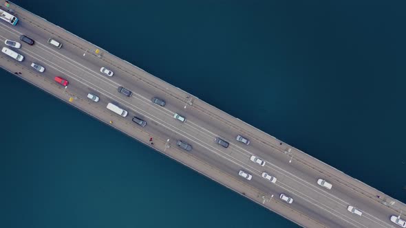 The bridge over the river. Car traffic on the bridge alt