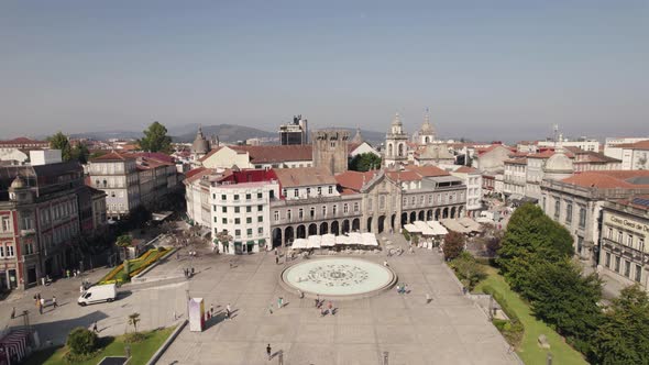 People walking in Braga downtown across the republic square and lapa church alt