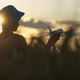 Funny Boy Playing with Airplane in the Golden Wheat Field at Sunset Boy Dreams of Being a Pilot - VideoHive Item for Sale