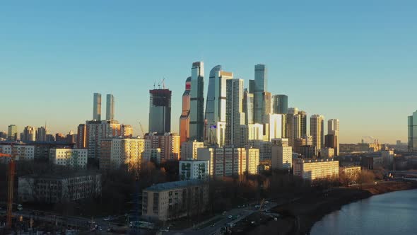 Flying Over the River with a View of Business Center Moscow City in Late Autumn