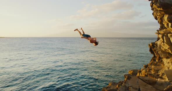 Backflip Cliff Jumping into the Ocean by MakanaCreative | VideoHive