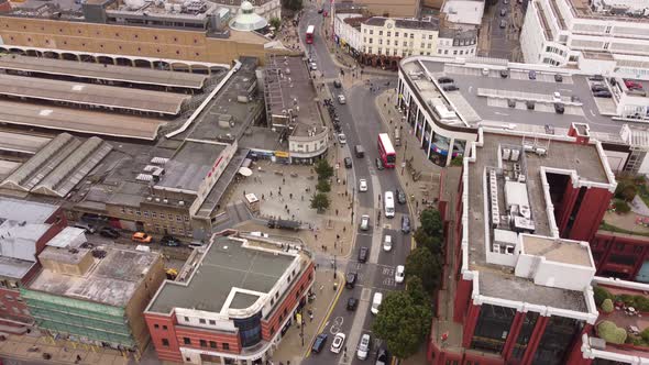 Drone Footage of a Small Area and Vehicle Traffic Near Wimbledon Railway Station alt