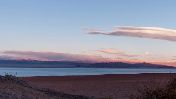 Moon rising above the lake alt